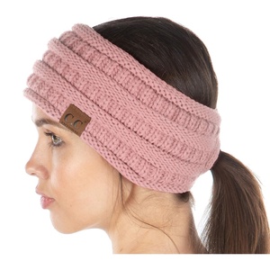 image:imageFunky Junque Womens Ponytail Headband  Soft Knit Winter Ear Warmer for Women Cable Knit Fleece Lined Head Wrap for Cold Weather  IvoryIndi Pink