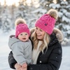 image:imageFunky Junque Mommy amp Me Matching Pom Beanie Set  Women Kids Family Knit AdultInfant  Cable KnitAdultInfant  Cable Knit  Candy Pink 2 Pack