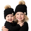 image:imageFunky Junque Matching Infant amp Toddler Pom Beanies  Winter Knit Hats for Baby Girls amp Siblings Adorable SetToddlerInfant  Black 2 Pack