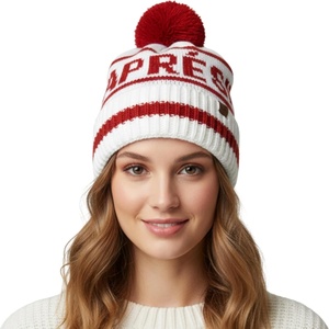 image:imageFunky Junque Aprs Ski Pom Pom Beanie for Women  Oversized Knit Winter Hat Warm Cozy Womens Hats for Ski Trips amp Snow DaysIvory Red Lettering