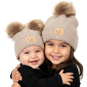 image:imageFunky Junque Matching Infant amp Toddler Pom Beanies  Winter Knit Hats for Baby Girls amp Siblings Adorable SetDiagonal Basketweave  Beige