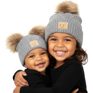 image:imageFunky Junque Matching Infant amp Toddler Pom Beanies  Winter Knit Hats for Baby Girls amp Siblings Adorable SetDiagonal Basketweave  Heather Grey