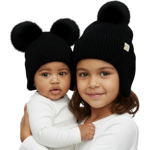 image:imageFunky Junque Matching Infant amp Toddler Pom Beanies  Winter Knit Hats for Baby Girls amp Siblings Adorable SetEar Flap  Black