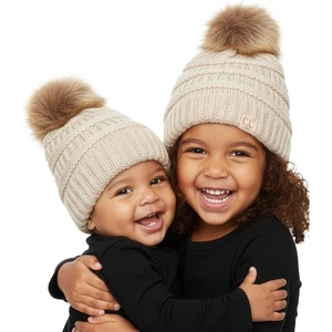 image:imageFunky Junque Matching Infant amp Toddler Pom Beanies  Winter Knit Hats for Baby Girls amp Siblings Adorable SetFaux Fur Pom  Beige