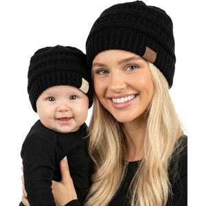 image:imageFunky Junque Mommy amp Me Beanie Set  Matching Knit Winter Hats for Baby Toddler Kids amp Moms Cute Family Beanies BundleAdult  Infant  Ribbed  Black 2 Pack
