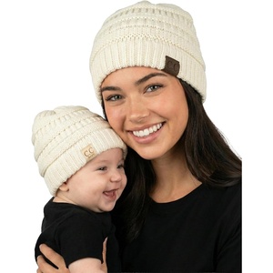 image:imageFunky Junque Mommy amp Me Beanie Set  Matching Knit Winter Hats for Baby Toddler Kids amp Moms Cute Family Beanies BundleAdult  Infant  Ribbed  Ivory 2 Pack