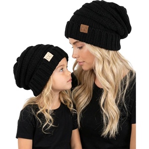 image:imageFunky Junque Mommy amp Me Beanie Set  Matching Knit Winter Hats for Baby Toddler Kids amp Moms Cute Family Beanies BundleAdult  Toddler  Oversized Black 2 Pk