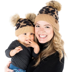 image:imageFunky Junque Mommy amp Me Double Pom Beanies  Mama amp Mini Matching Winter Outfits Mom amp Infant Baby Girl Beanie Hat SetLeopard  Latte