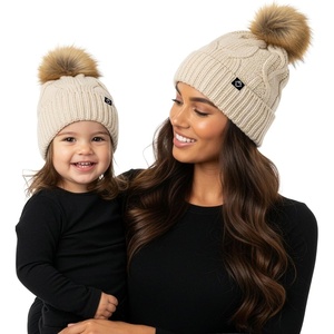 image:imageFunky Junque Mommy amp Me Matching Pom Beanie Set  Women Kids Family Knit AdultInfant  Cable KnitAdultToddler  Cable Knit  Beige 2 Pack