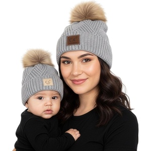 image:imageFunky Junque Mommy amp Me Pom Pom Beanies Set  Infant Baby amp Mom Matching Winter Outfits Warm Newborn amp Womens Beanie HatsDiagonal Basketweave  Heather Grey