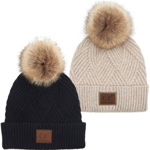 image:imageFunky Junque Womens Pom Pom Beanie  Soft Knit Winter Hats for Women amp Teens Warm Fashionable Beanie with Faux Fur Poms2 Pack Black  Beige  Diagonal Stripes