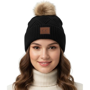 image:imageFunky Junque Womens Pom Pom Beanie  Soft Knit Winter Hats for Women amp Teens Warm Fashionable Beanie with Faux Fur PomsBlack  Diagonal Stripes