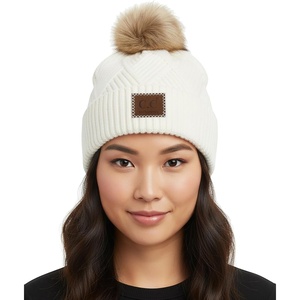 image:imageFunky Junque Womens Pom Pom Beanie  Soft Knit Winter Hats for Women amp Teens Warm Fashionable Beanie with Faux Fur PomsWhite  Diagonal Stripes