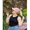 image:imageFunky Junque Criss Cross Ponytail Cap Messy Bun Distressed Baseball Hat  Ponytail messy bun baseball cap for women with crisscross elastic bands for beach gym gardening sporting events amp workCotton Eyelet  Rose