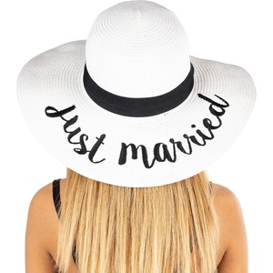 image:imageFunky Junque Bridal Straw Sun Hat Embroidered Bachelorette Party  Woven paper straw bridal hat with embroidered cursive sayings for beach outings bachelorette parties amp sunny daysA Just Married White