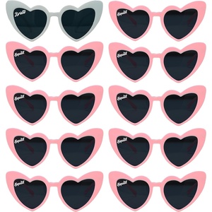 image:imageFunky Junque Heart Shaped Sunglasses Women Fashion Eyewear  Sturdy plastic heart shaped sunglasses with playful frames for bachelorette parties girls night out amp photos10 Pack  1 White Bride  9 Pink Squad