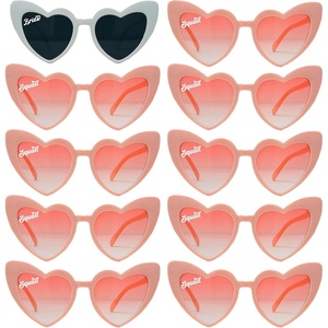 image:imageFunky Junque Heart Shaped Sunglasses Women Fashion Eyewear  Sturdy plastic heart shaped sunglasses with playful frames for bachelorette parties girls night out amp photos10 Pack  1 White Bride  9 Peach Squad