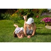 image:imageFunky Junque Girls Criss Cross Ponytail Baseball Cap Kids Messy Bun Hat  Lightweight mesh cap with criss cross elastic bands for camping playgrounds softball volleyball amp recess1 Tie Dye  Cotton Candy