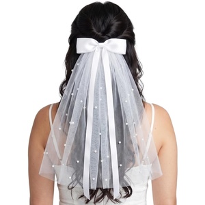 image:imageBridal Hair Clip  Multi Pearl Bow  White  White bow hair clip with secure alligator grip for bachelorette parties bridal showers photos amp bride giftsSatin Ribbon Bow w Pearl Clip