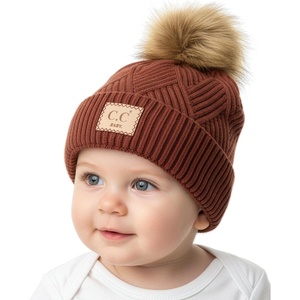 image:imageFunky Junque Baby Pom Pom Beanie  Soft Knit Infant Winter Hat for Baby Girls amp Boys Cozy Warm Newborn Beanie 012 MonthsDiagonal Basketweave Pattern  Brick