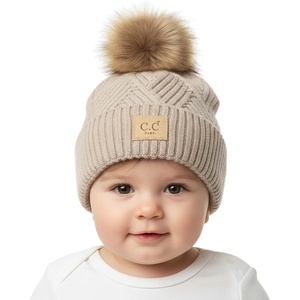 image:imageFunky Junque Baby Pom Pom Beanie  Soft Knit Infant Winter Hat for Baby Girls amp Boys Cozy Warm Newborn Beanie 012 MonthsDiagonal Basketweave Pattern  Multi Beige