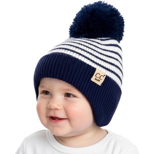 image:imageFunky Junque Baby Pom Pom Beanie  Soft Knit Infant Winter Hat for Baby Girls amp Boys Cozy Warm Newborn Beanie 012 MonthsStriped Earflap  NavyWhite