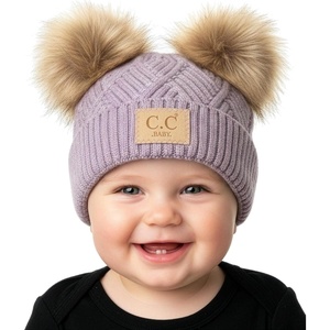 image:imageFunky Junque Double Pom Pom Baby Beanie  Newborn Girl Winter Hat 012 Months Cute Cozy Knit Infant Beanies for Cold WeatherDiagonal Basketweave Pattern  Lavender 2 Pom