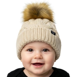 image:imageFunky Junque Fleece Lined Baby Beanie  Soft Cozy Cable Knit Winter Hat with Pom Pom for Infants 012 MonthsBeige