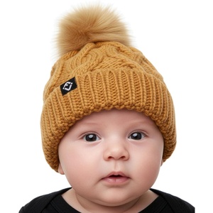 image:imageFunky Junque Fleece Lined Baby Beanie  Soft Cozy Cable Knit Winter Hat with Pom Pom for Infants 012 MonthsTan