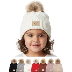 image:imageFunky Junque Toddler Pom Beanie  Kids Winter Hat for Ages 14 Baby Boy amp Girl Knit Beanies Warm Cozy Knit Snow HatsDiagonal Stripes Faux Fur Pom WPatch White
