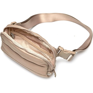 image:imageFunky Junque Versatile Black Fanny Pack Belt Bag for Women and Girls Adjustable Crossbody Waist Bag with Multiple Pockets  Aztec  Black  Adjustable belt bag with crossbody strap for travel errands everyday wear festivals amp handsfree carryPuffer  Taupe